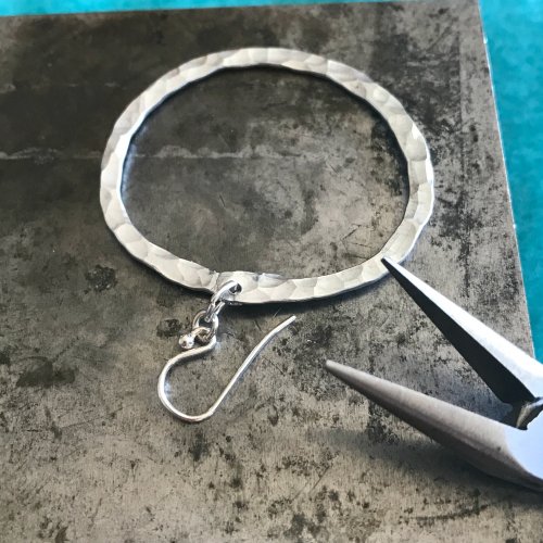 Margot Potter's Silver Circle Earrings - , Contemporary Wire Jewelry, Forging, Forging Jewelry, Jewelry Forging, How To Punch Holes, Hole Punching, Punch A Hole, add ear wires